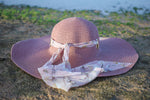 CHAPEAU DE PLAGE ELEGANT EN ROSE